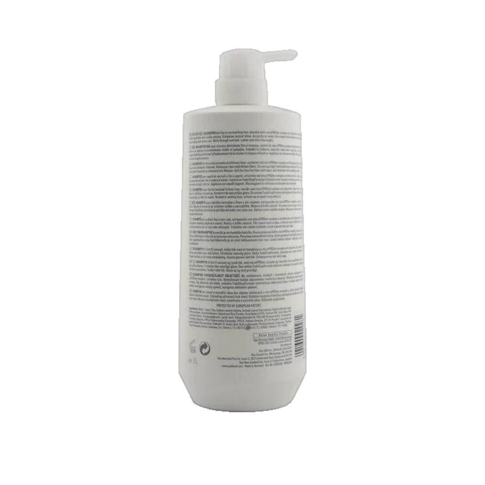 Goldwell Dual Senses Shampoo Flasche, Rückseite. Weiß, mit Pumpe. Text: Produktinformationen, Inhaltsstoffe, Hersteller.