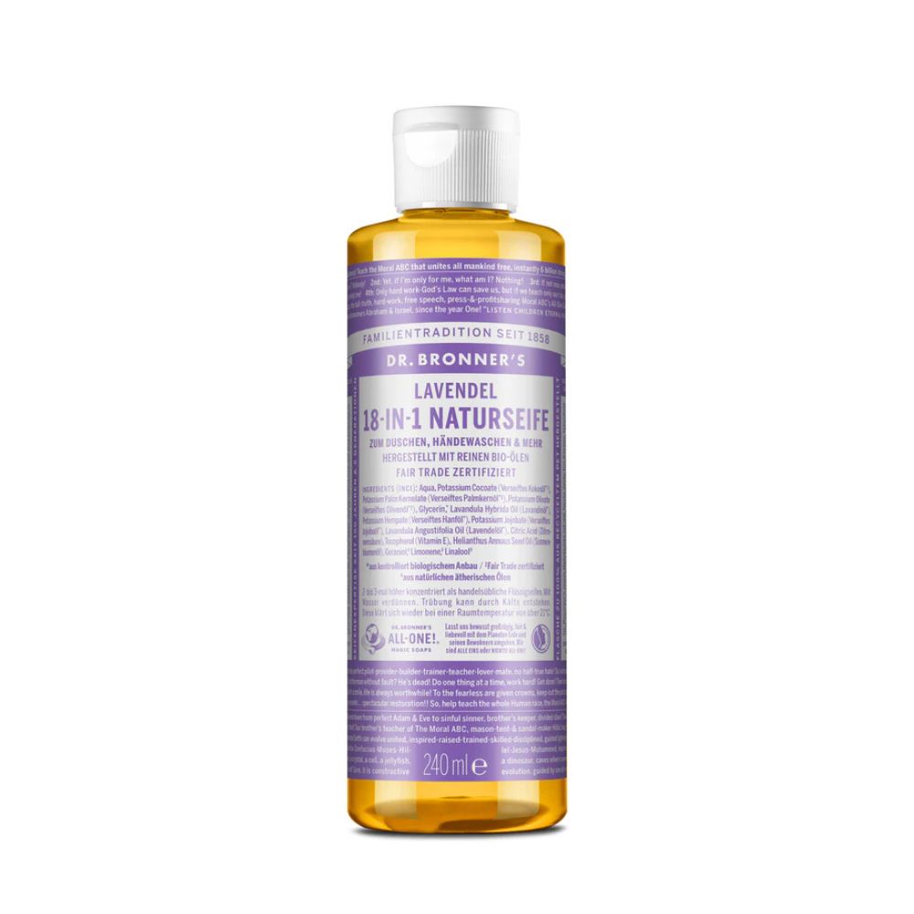 Flasche mit Flüssigseife. Aufschrift: Dr. Bronner's 18-in-1 Naturseife Lavendel. Weißer Verschluss, lila Etikett, gelbliche Flüssigkeit.