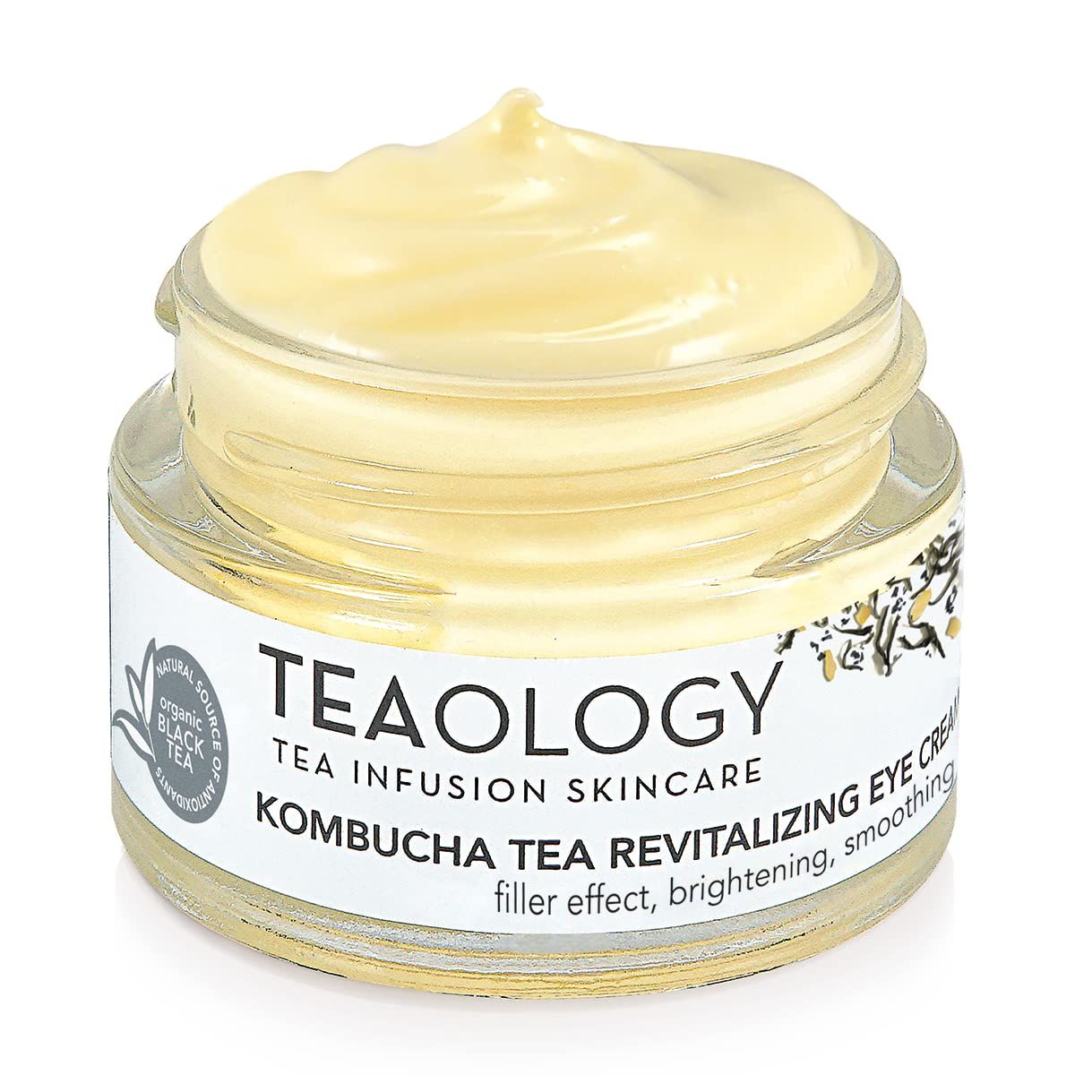Glasbehälter mit gelblicher Creme. Auf dem Etikett steht "TEAOLOGY", "Kombucha Tea Revitalizing Eye Cream".