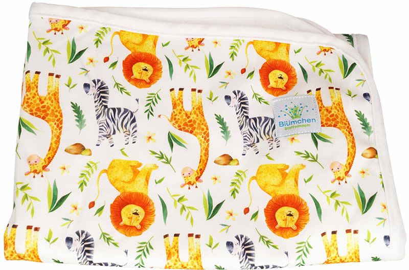 Wickelunterlage mit Zebra-, Giraffen- und Löwenmuster. Weißer Rand, Label mit "Blümchen". Wasserabweisend.