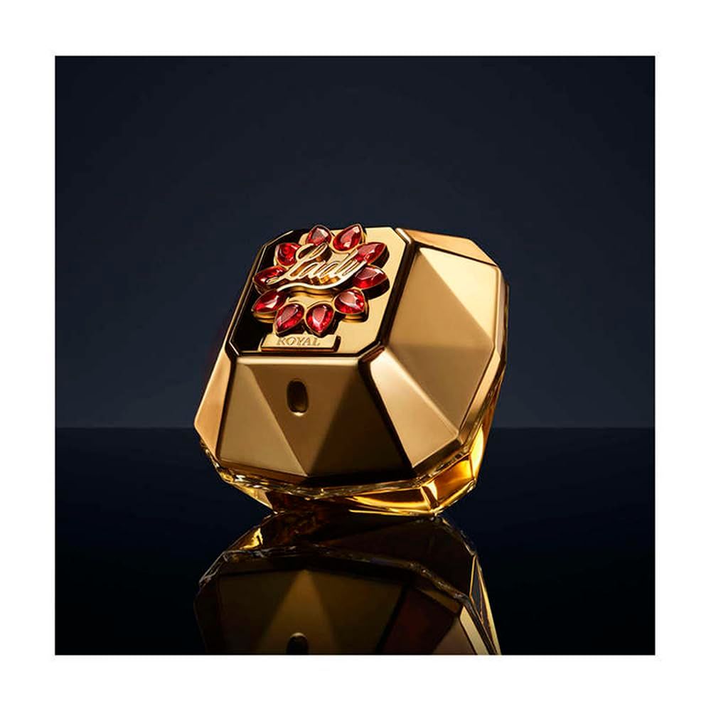 Goldener Flakon mit rotem Deckel. Auf schwarzem Hintergrund.