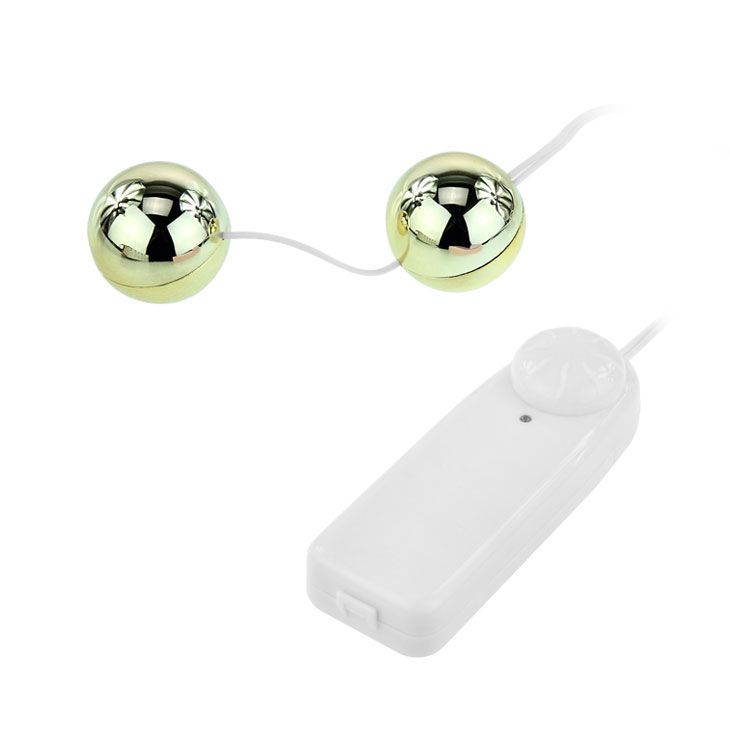 Goldener Vibrator mit zwei Kugeln und weißem Steuergerät, Draufsicht.