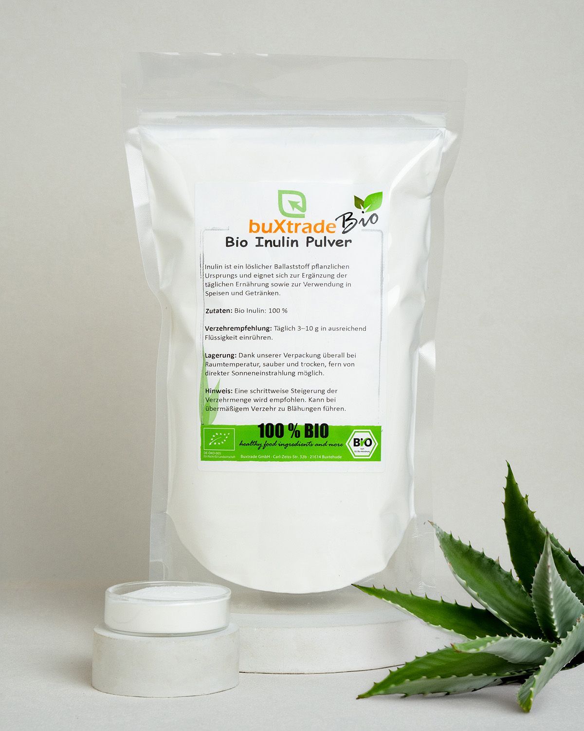 buXtrade Bio Inulin Pulver Verpackung mit Behälter und Agavenblatt.