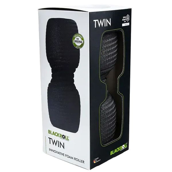 Verpackung der BLACKROLL® TWIN Faszienrolle. Schwarzer Karton mit Produktabbildung. Produktname und Logo. Sichtfenster mit Produktansicht.