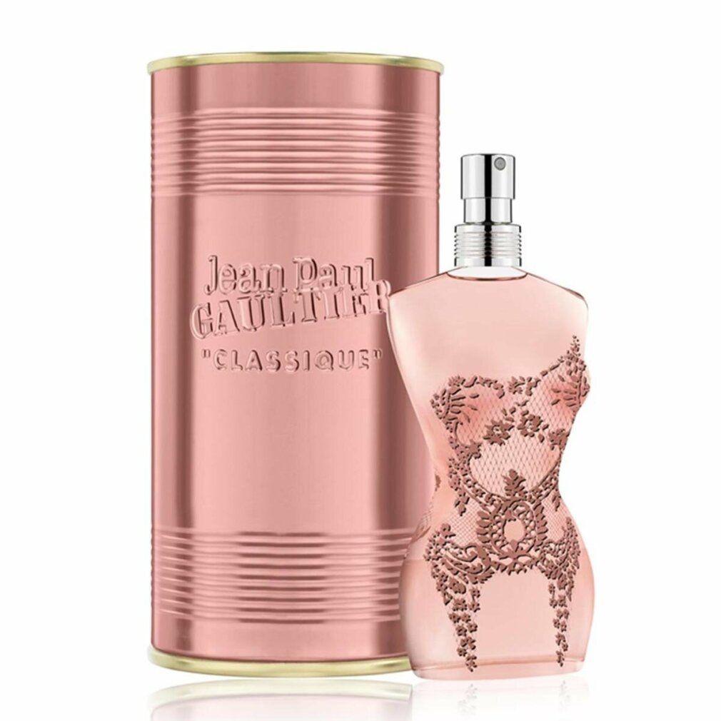 Parfümflakon in Frauenkörperform mit Spitze, neben Dose. Jean Paul Gaultier, Classique.