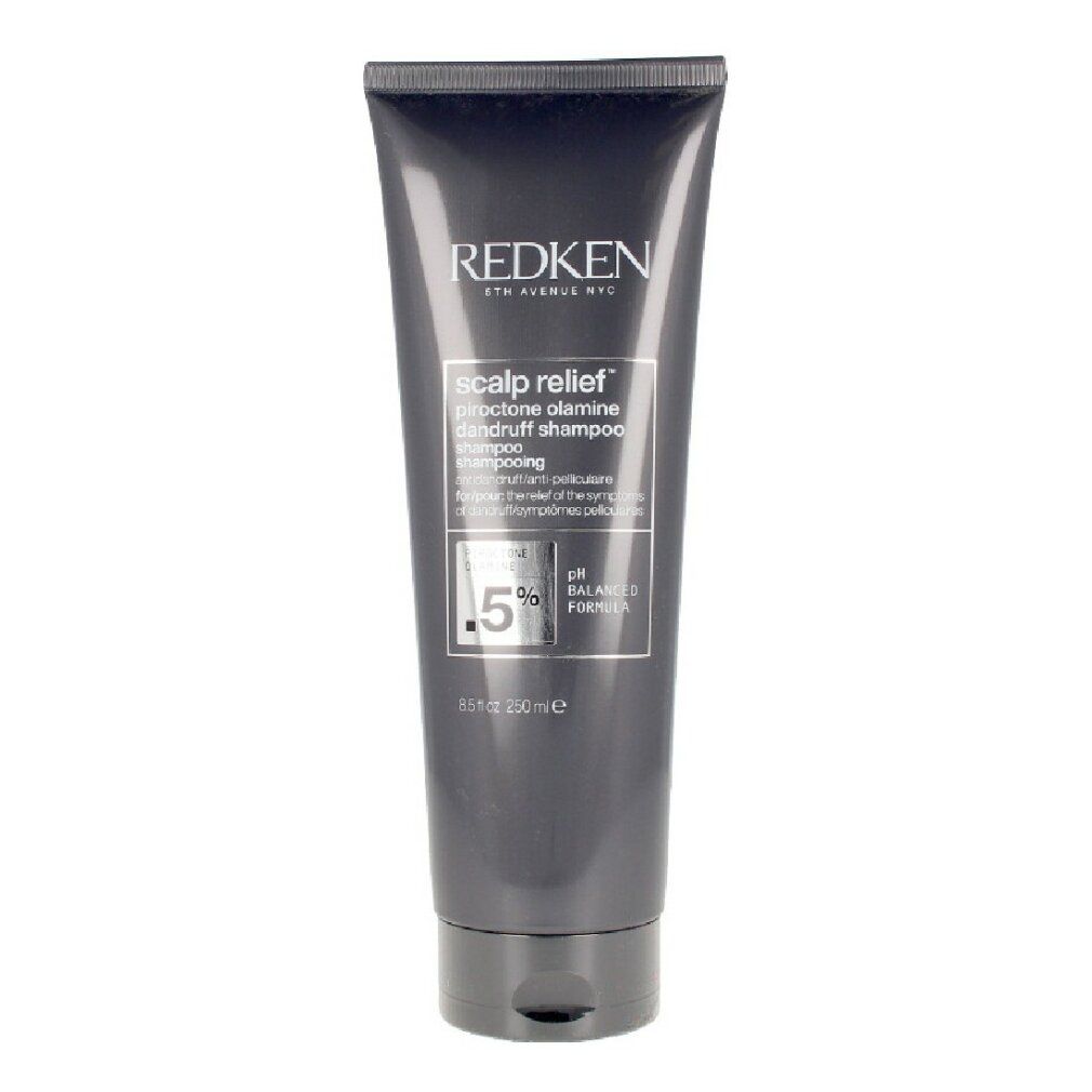 Dunkelgraue Tube mit Produktinformationen. Aufschrift: Redken, Scalp Relief, 0,5% Pirocton Olamin, pH-ausgeglichen.