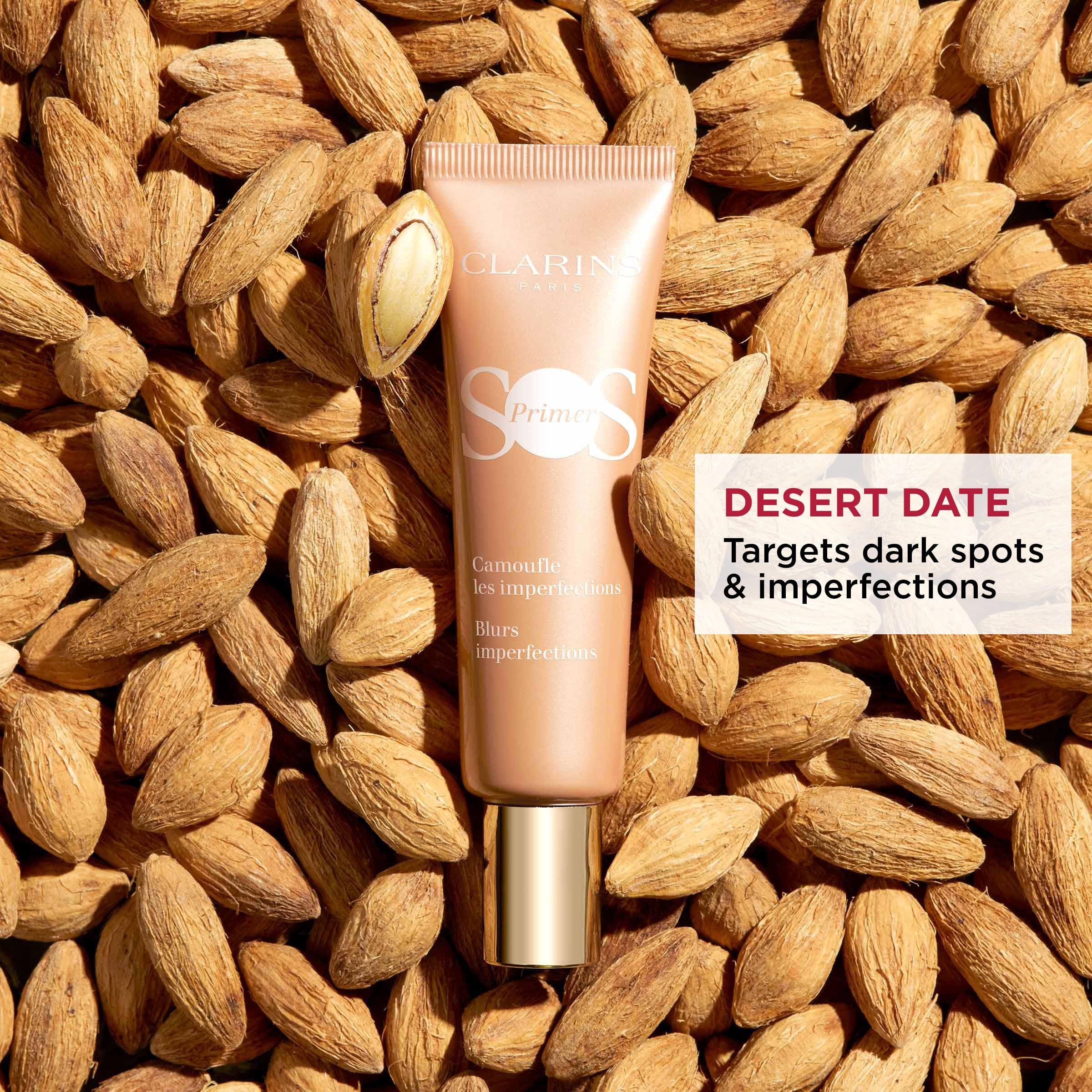 Tube auf Mandeln. Text: DESERT DATE. Targets dark spots & imperfections.