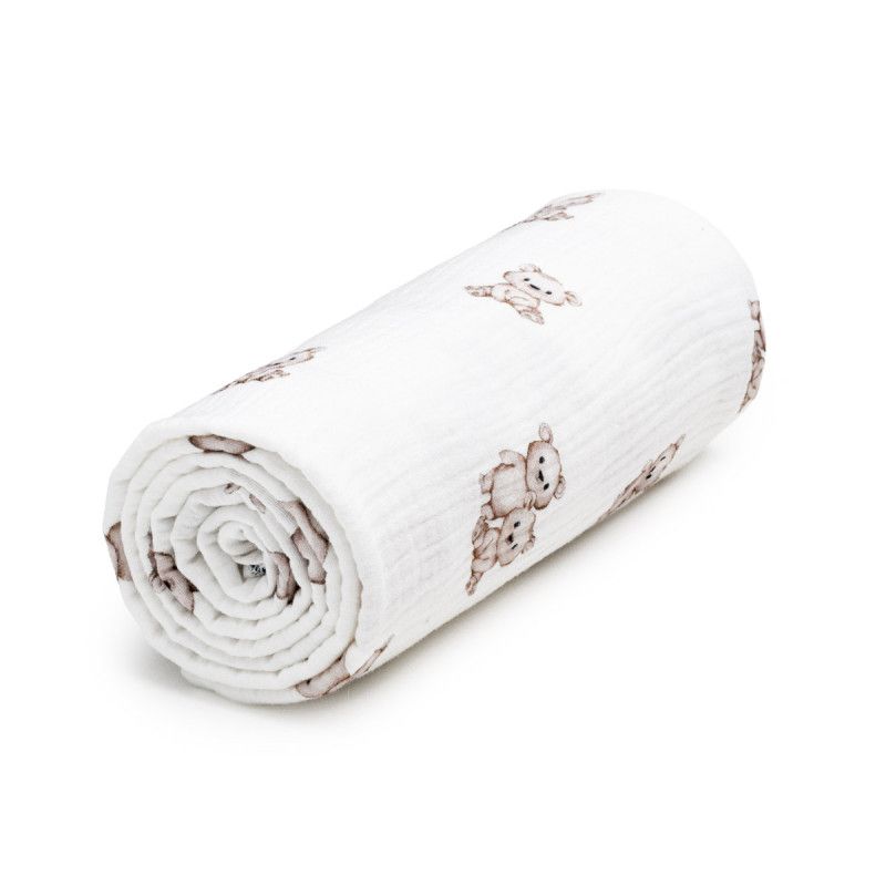 Gerolltes Musselinbadetuch mit Teddybären-Muster. Weißer Stoff mit braunen Teddybären. Gewebte Textur.
