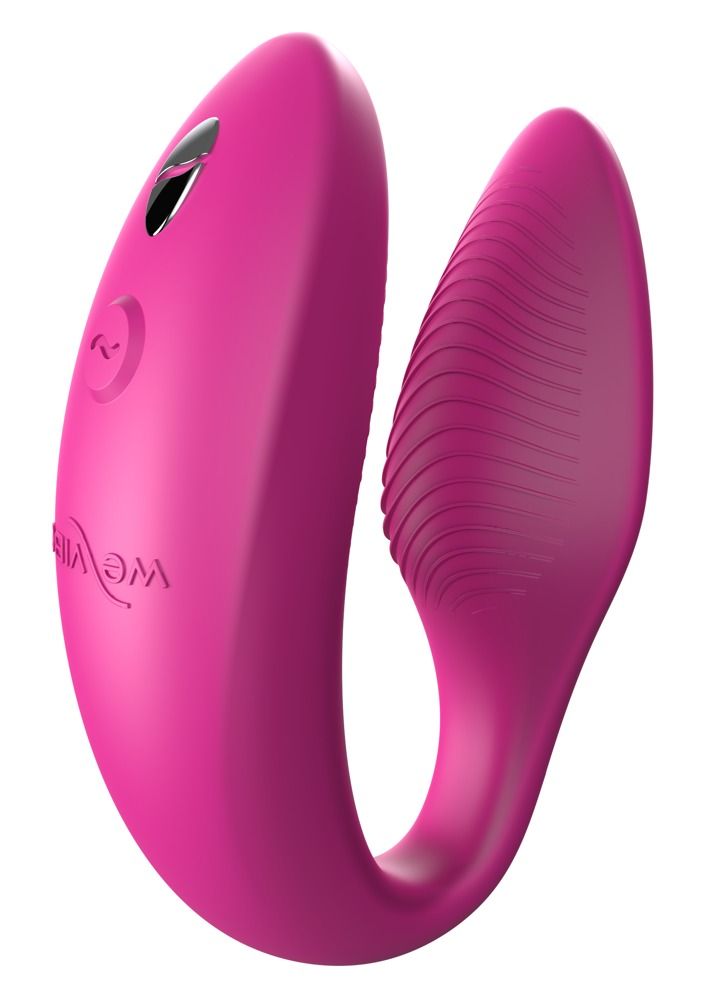 Rosa Wellness-Produkt mit geschwungener Form und geriffelter Oberfläche. Mit Logo und Bedienknopf.