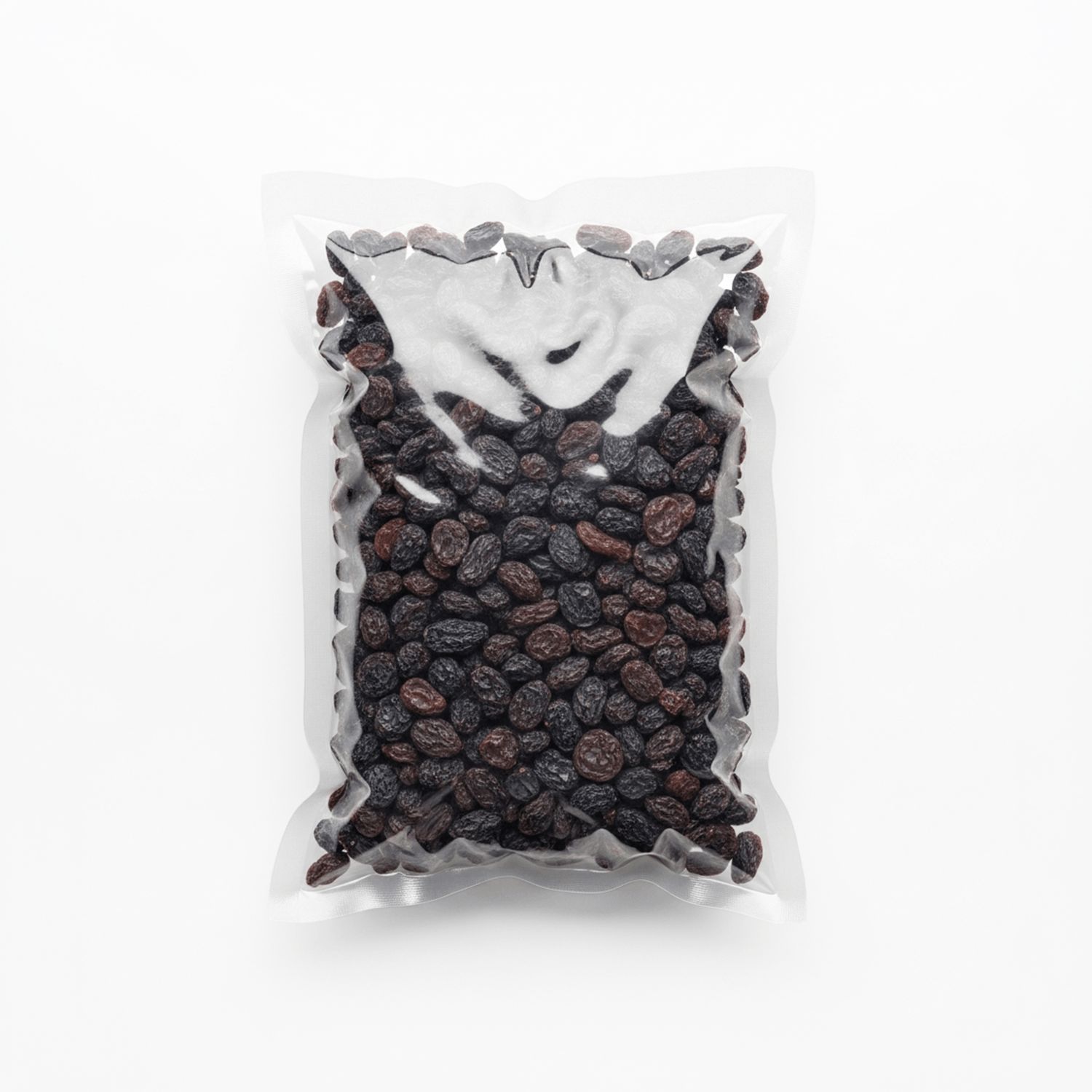 Vakuumverpackte schwarze Rosinen.