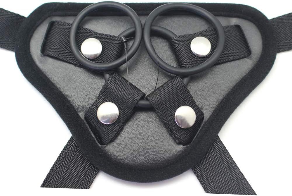 Schwarzer, gepolsterter Augenverband mit zwei Ringen und Befestigungsbändern.