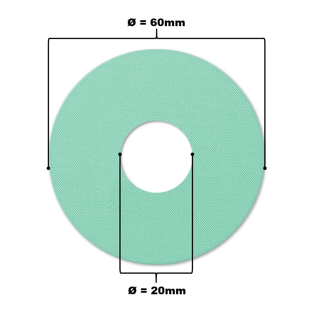 Hellgrüner Katheterpatch mit Loch. Durchmesser 60mm, Lochdurchmesser 20mm.