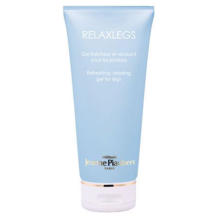 Hellblaue Tube mit weißem Deckel. Aufschrift RELAXLEGS, darunter Text in Französisch und Englisch. Marke Jeanne Piaubert.