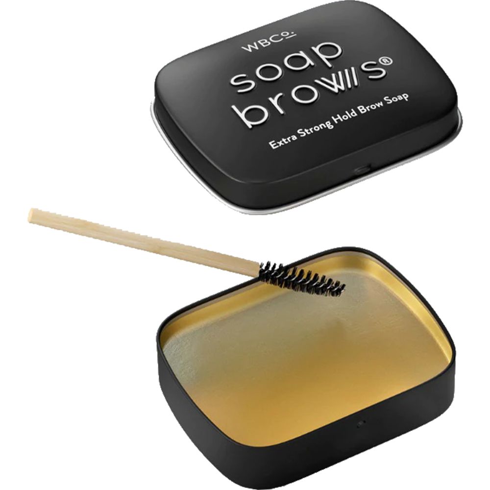Schwarze Dose mit goldfarbenem Inhalt und Bürste. Deckel mit Schriftzug 'soap brows'.