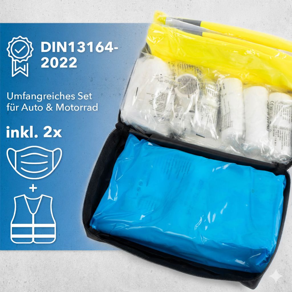 Geöffnete KFZ-Verbandtasche mit Inhalt. DIN 13164-2022 Zertifizierung. Enthält Masken und Warnweste.