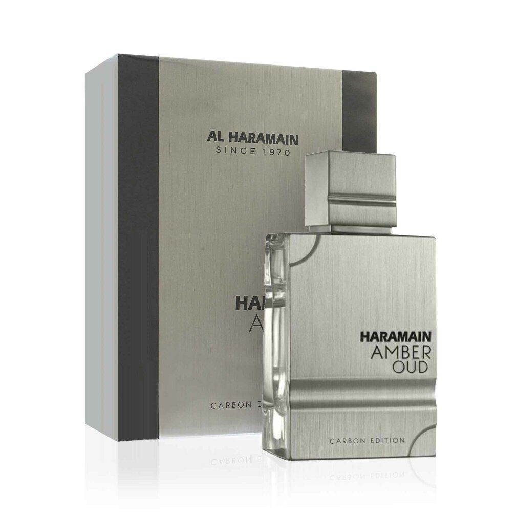 Parfümflakon und Verpackung. Silberfarbenes Design mit Schriftzug HARAMAIN AMBER OUD CARBON EDITION. Rechteckige Form.