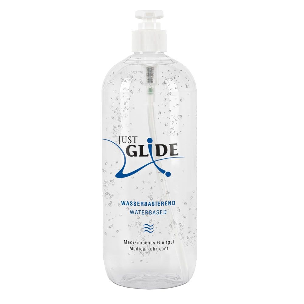 Transparente Flasche mit Dosierpumpe. Aufschrift: JUST GLIDE, Wasserbasiert, Medizinische Gleitgel. Siegel.