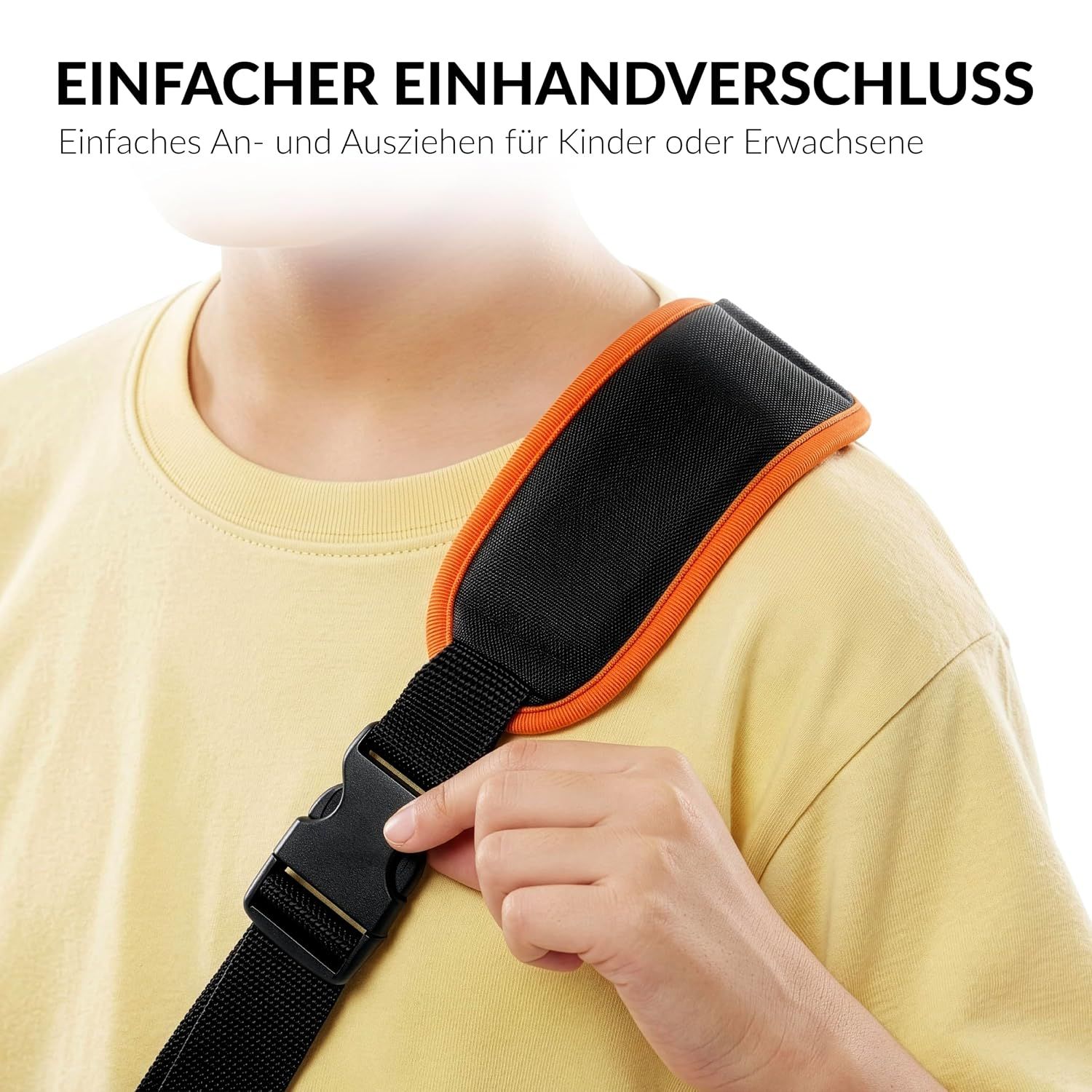 Schultergurt mit orangefarbener Polsterung und schwarzem Gurtband.