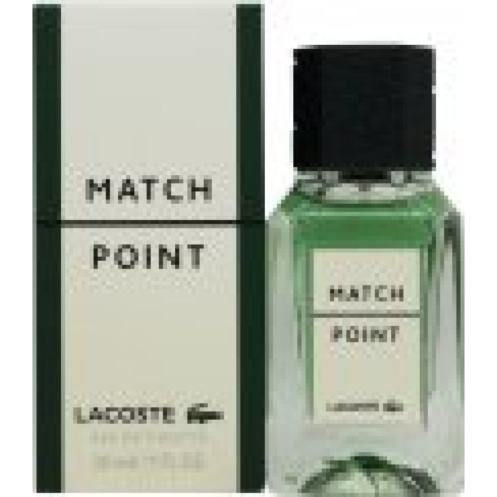 Eau de Toilette Spray und Verpackung. Aufschrift: MATCH POINT, LACOSTE. Flakon mit schwarzem Deckel, grüne Flüssigkeit.