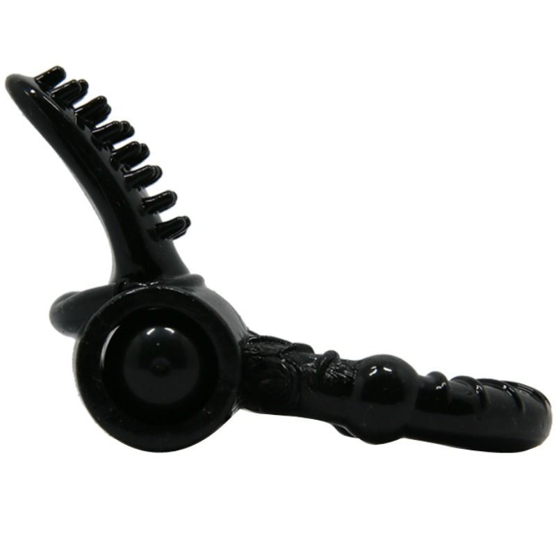 Schwarzes Wellness-Produkt. Gebogene Form mit Noppen und einem runden Element. Ein weiteres rundes Element.