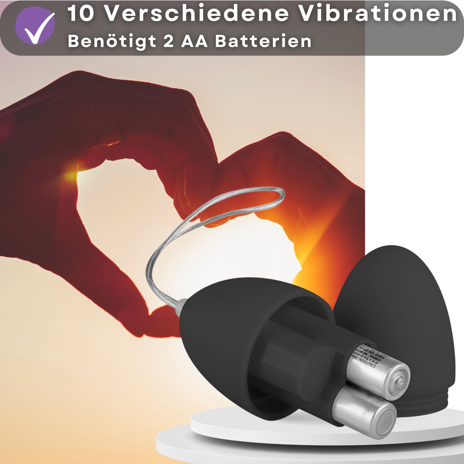 Schwarzer Ei-Vibrator, geöffnet. Zwei AA-Batterien sichtbar. Text: 10 Vibrationen, benötigt 2 AA Batterien.