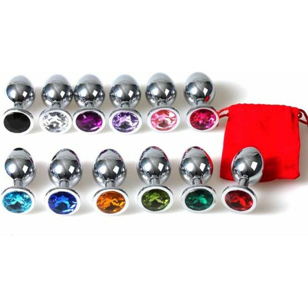 Mehrere Analplugs mit silberfarbenem Schaft und farbigen Kristallbasen. Roter Beutel.