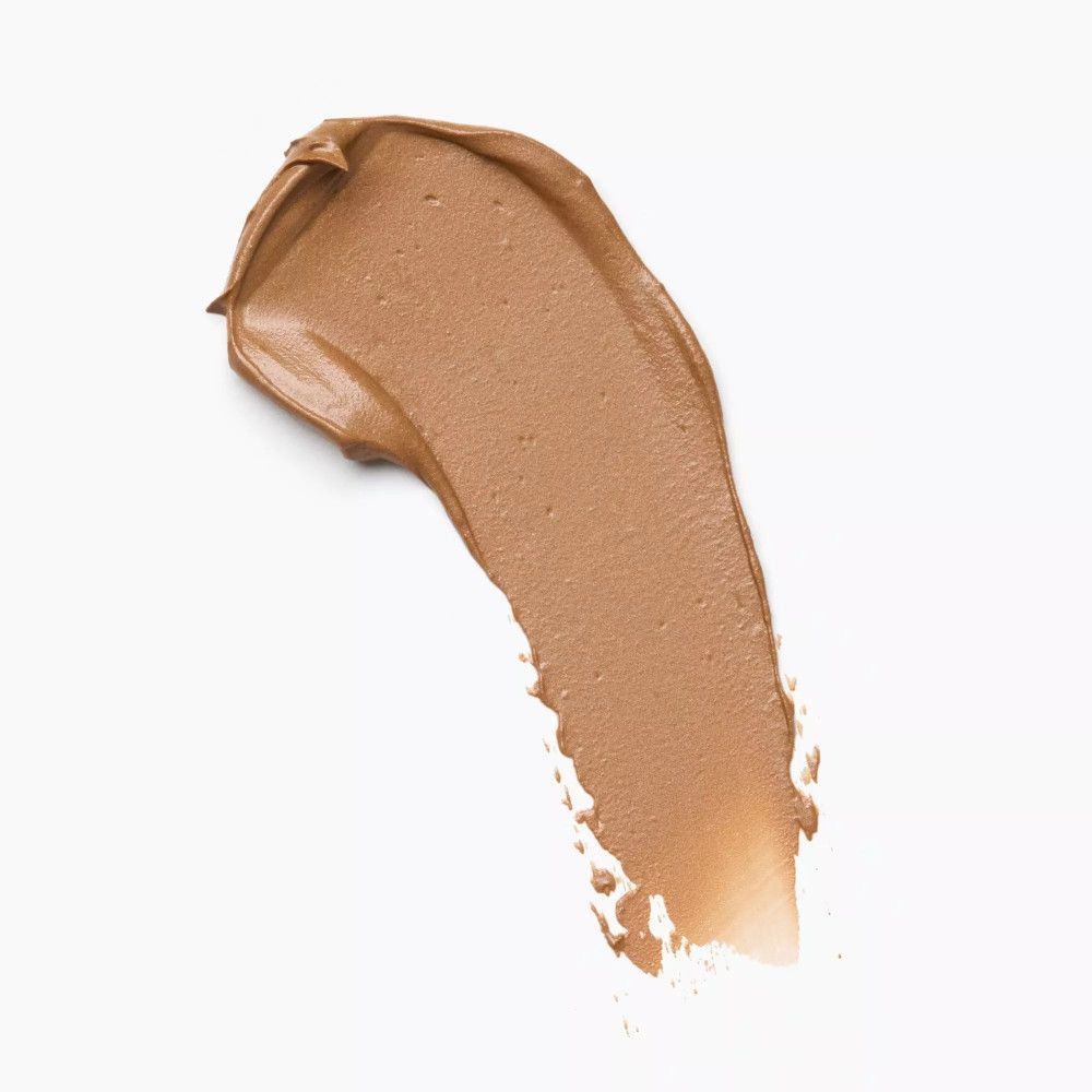 Hellbrauner Farbstrich. Textur: cremig. Hintergrund: weiß.