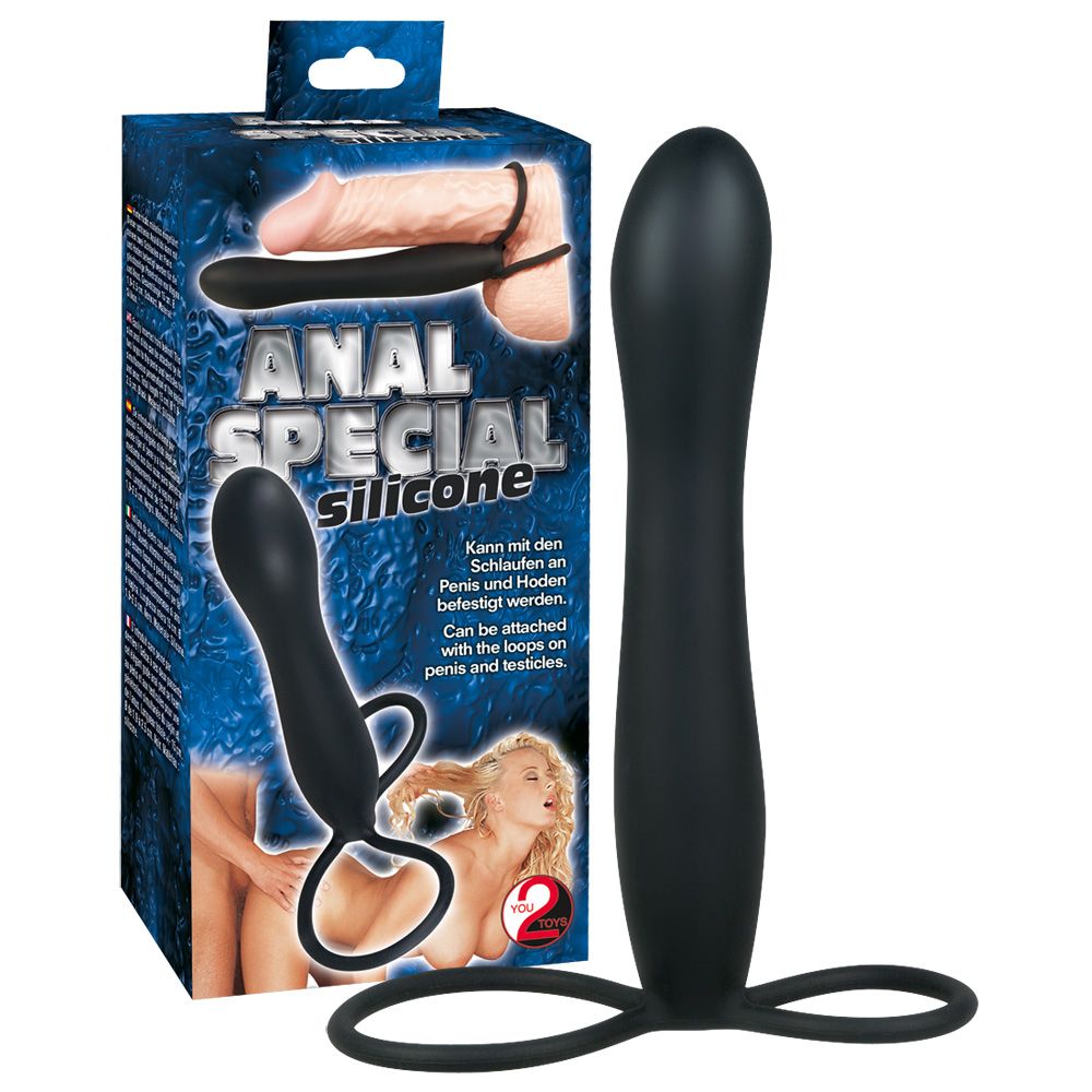 Schwarzer Silikon-Dildo mit Ring. Verpackung mit Produktname und Abbildung. Marke: You2Toys.