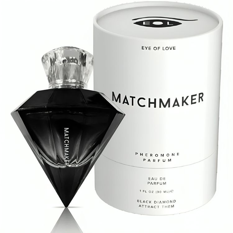 Schwarzer Diamant-Parfümflakon mit Diamantform und weißer Verpackung. Aufschrift: MATCHMAKER, Pheromon Parfum, EYE OF LOVE.