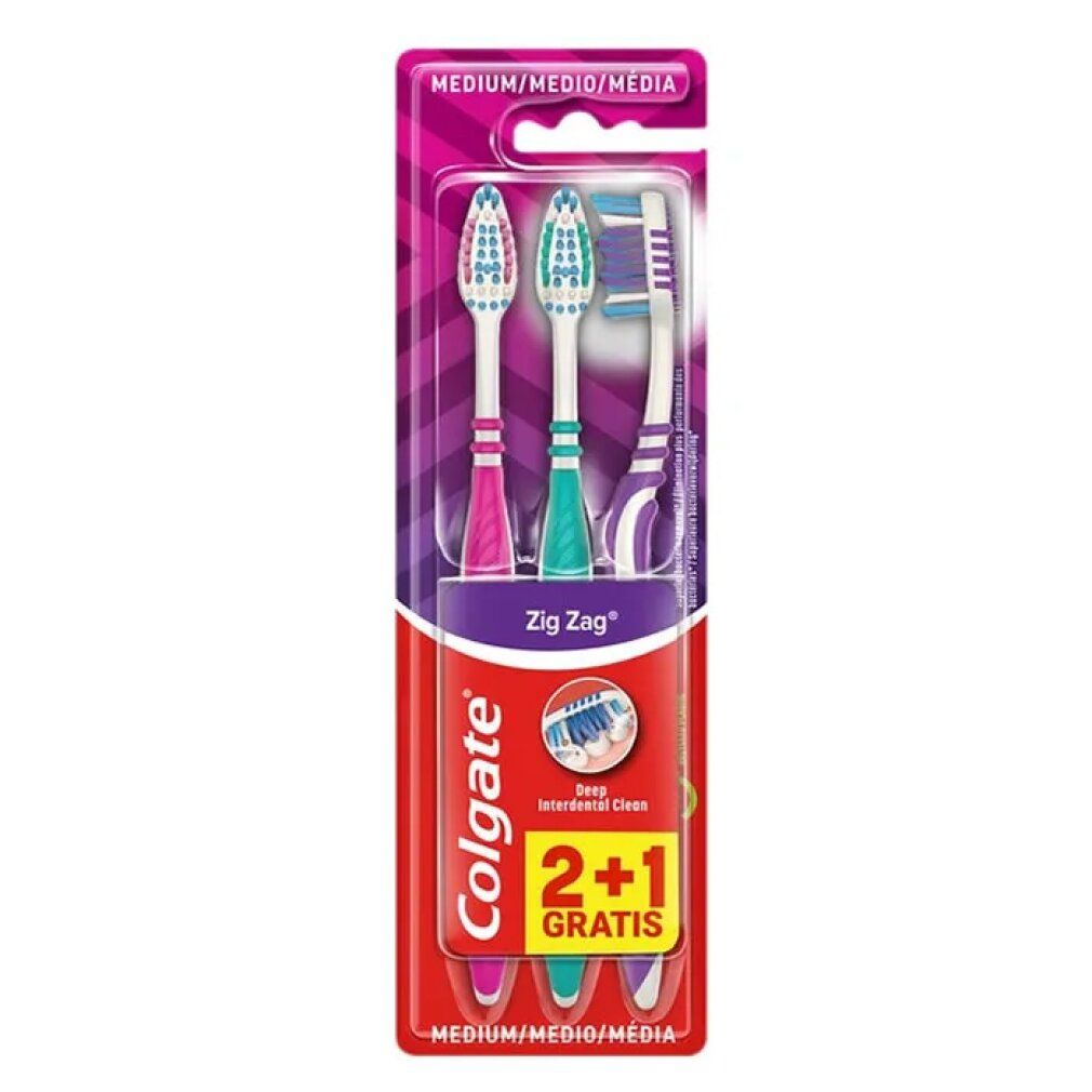 Zahnbürsten-Packung mit drei Colgate Zig Zag Bürsten. Farben: pink, grün, lila. 2+1 Gratis-Angebot. Medium-Kennzeichnung.