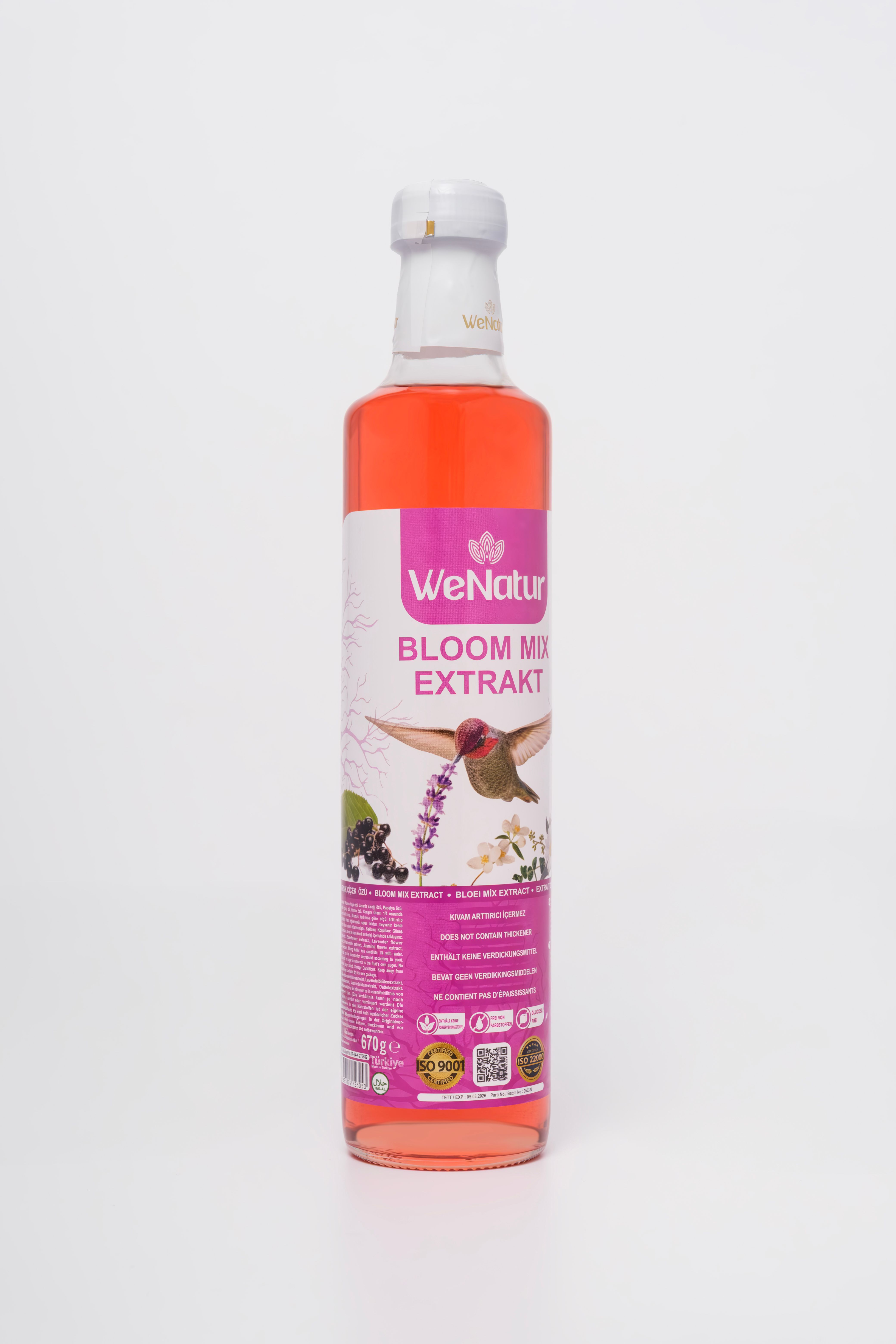 WeNatur Bloom Mix Extrakt Flasche mit Kolibri-Motiv.