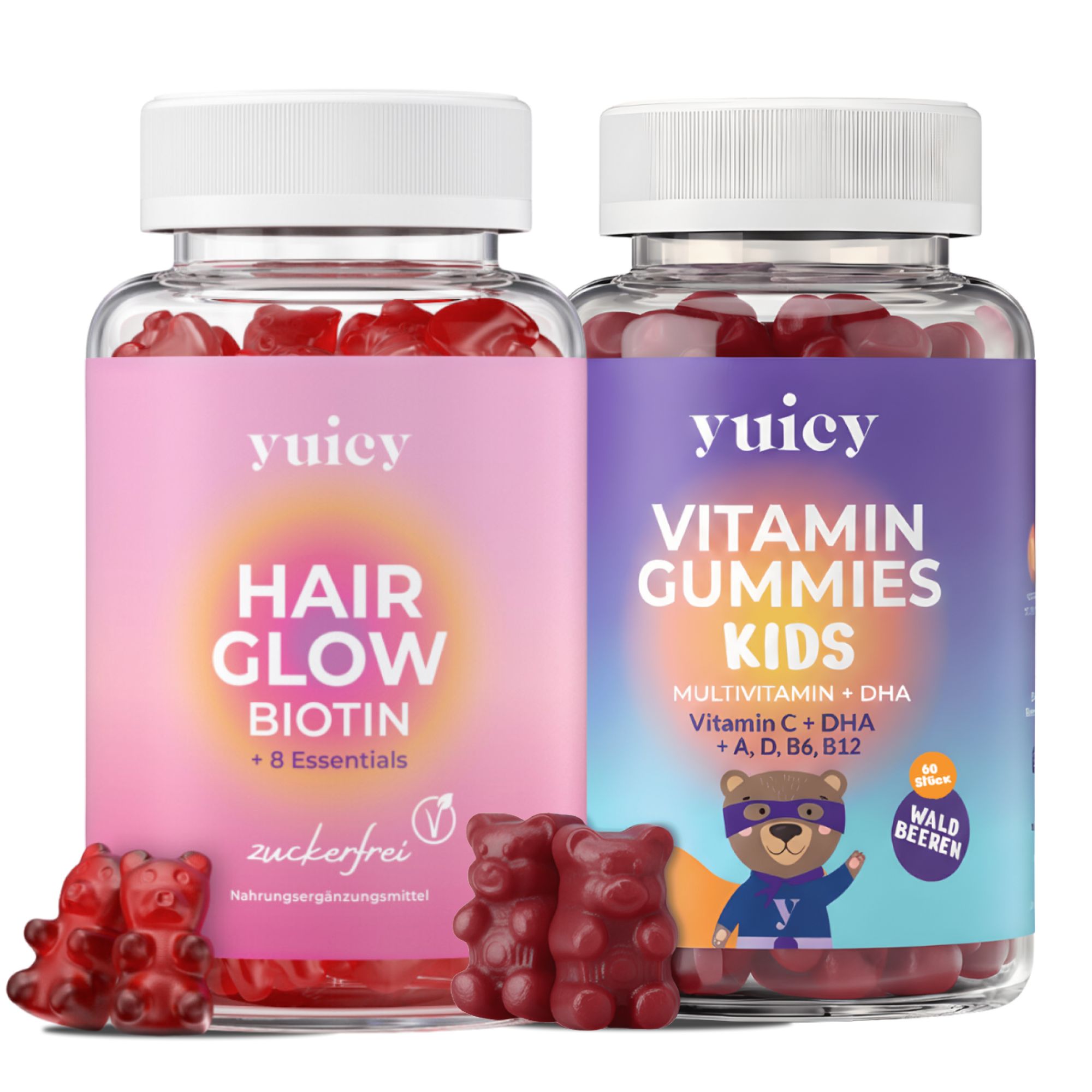 Zwei Flaschen yuicy® Hair Glow und Kids Multivitamin Gummibärchen. Rote Gummibärchen liegen daneben. Aufschrift: Hair Glow, Vitamin Gummies Kids.