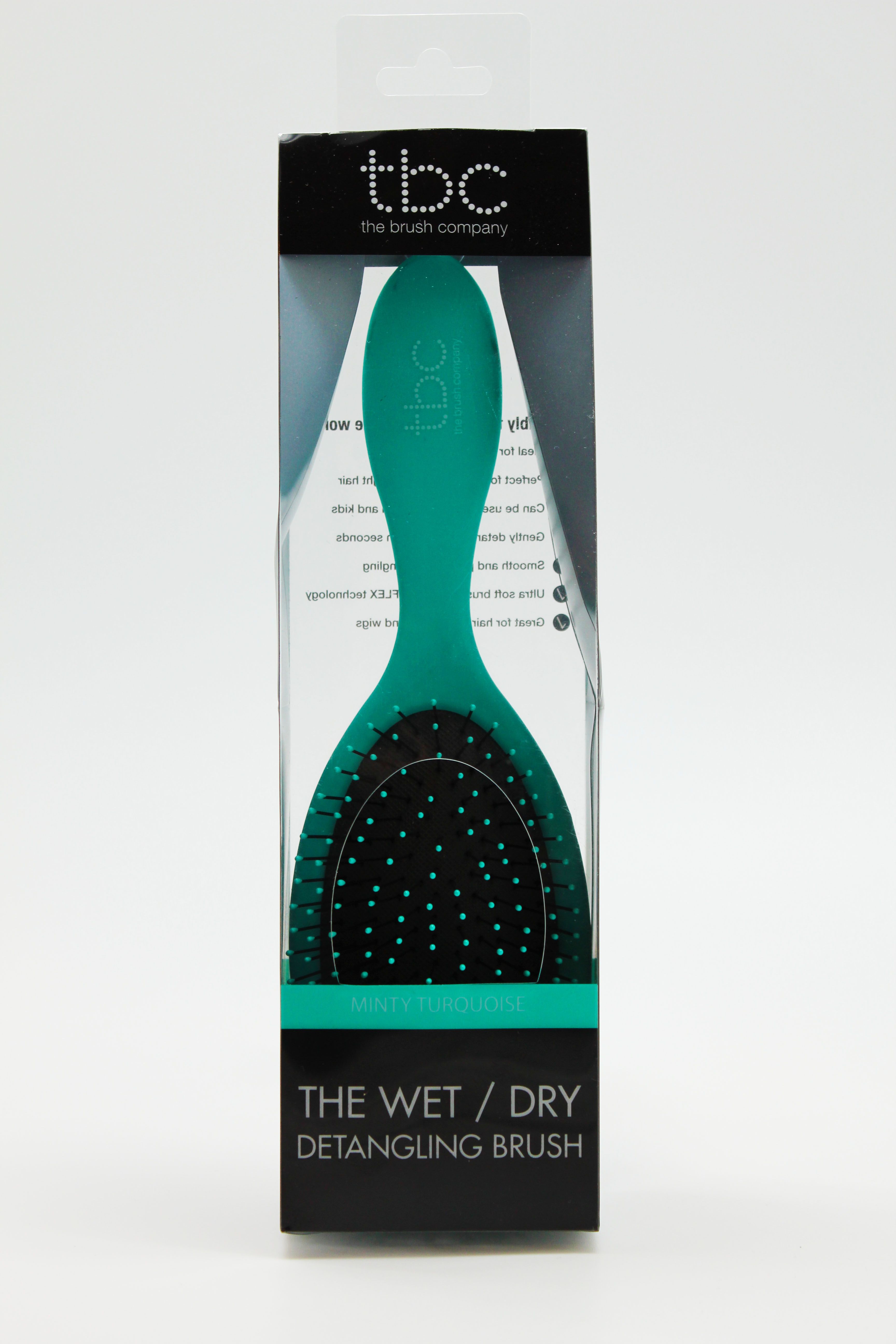 TBC Wet & Dry Haarbürste in Mintgrün-Türkis, verpackt in durchsichtiger Hülle.
