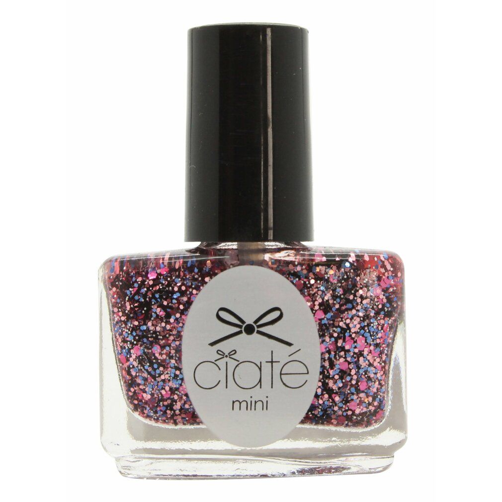 Nagellackflasche mit schwarzem Deckel. Auf dem Etikett steht "ciaté mini". Der Lack enthält Glitzer in Rosa, Blau und Lila.