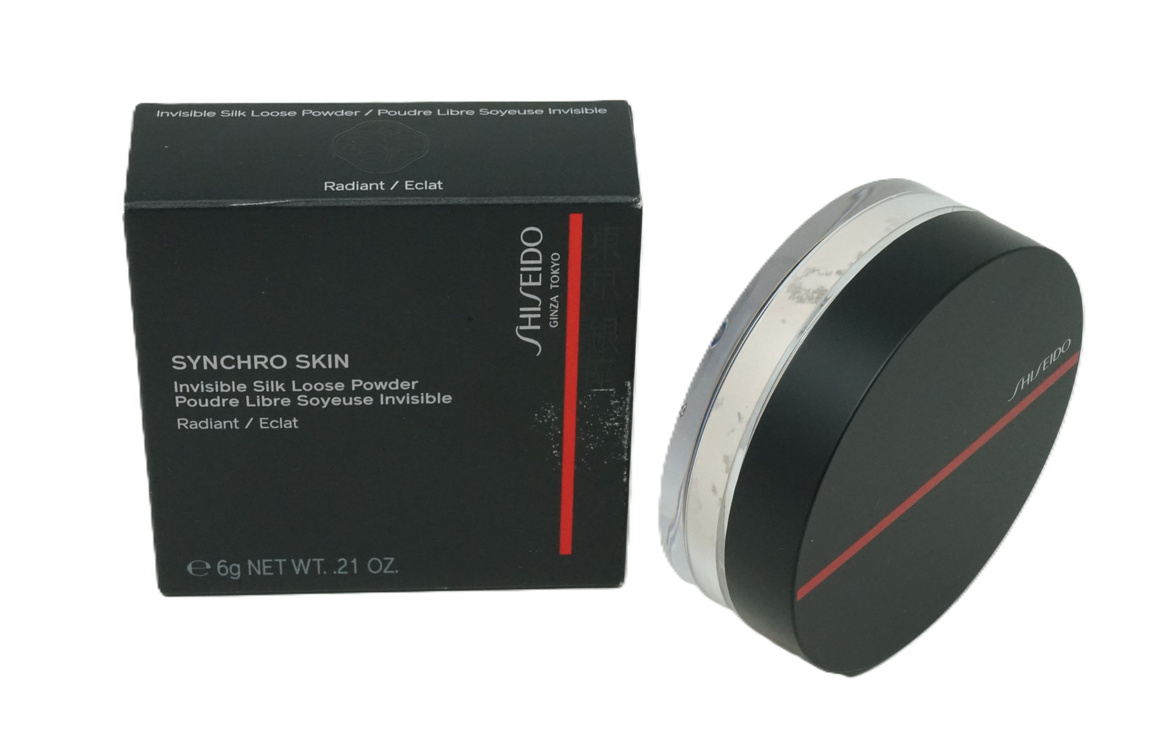 Schwarze Dose mit rotem Streifen und Verpackung. Marke: Shiseido. Produktname und Informationen auf der Verpackung. Inhalt: 6g.