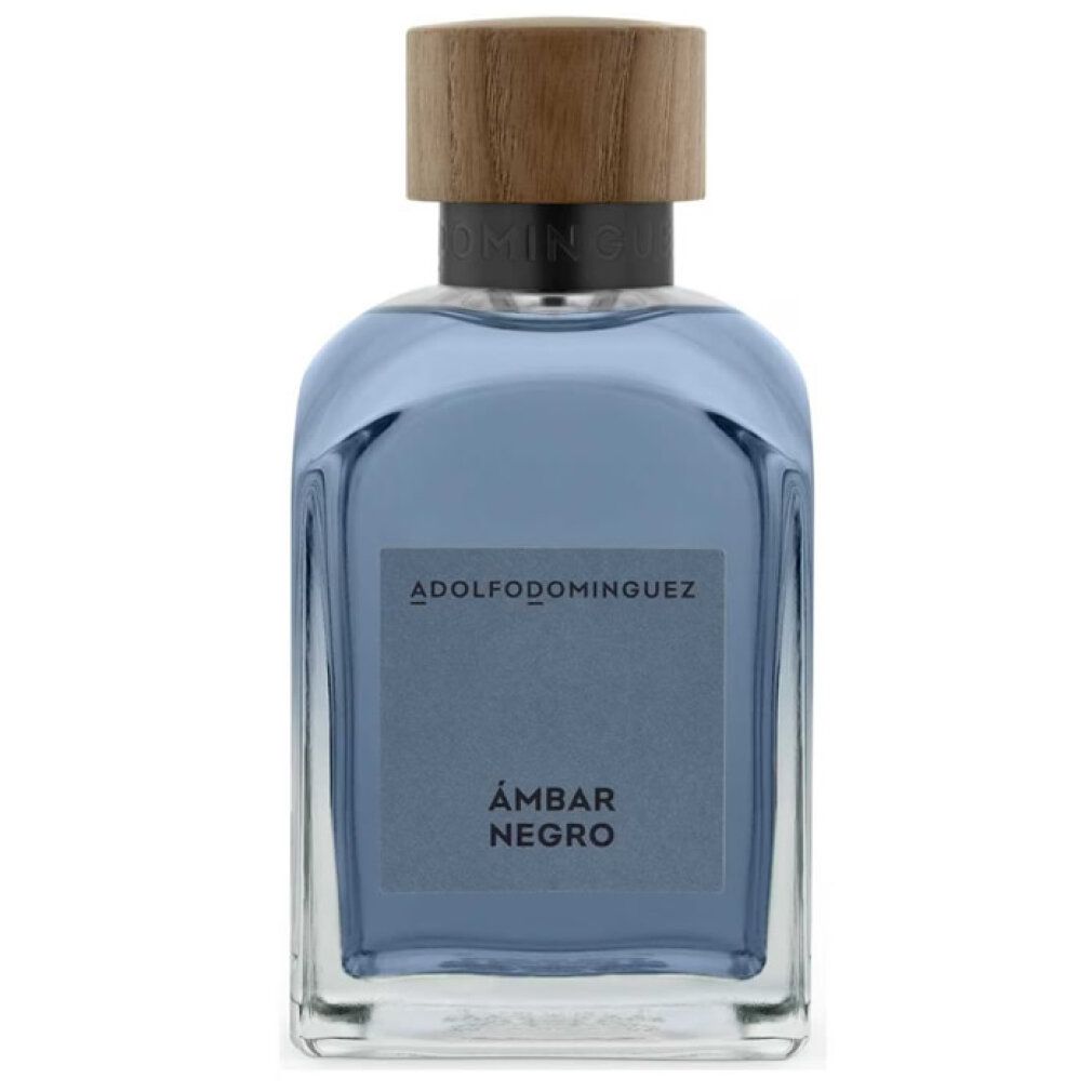 Glasflakon mit Holzdeckel. Aufschrift: ADOLFODOMINGUEZ, ÁMBAR NEGRO. Blaue Flüssigkeit sichtbar.