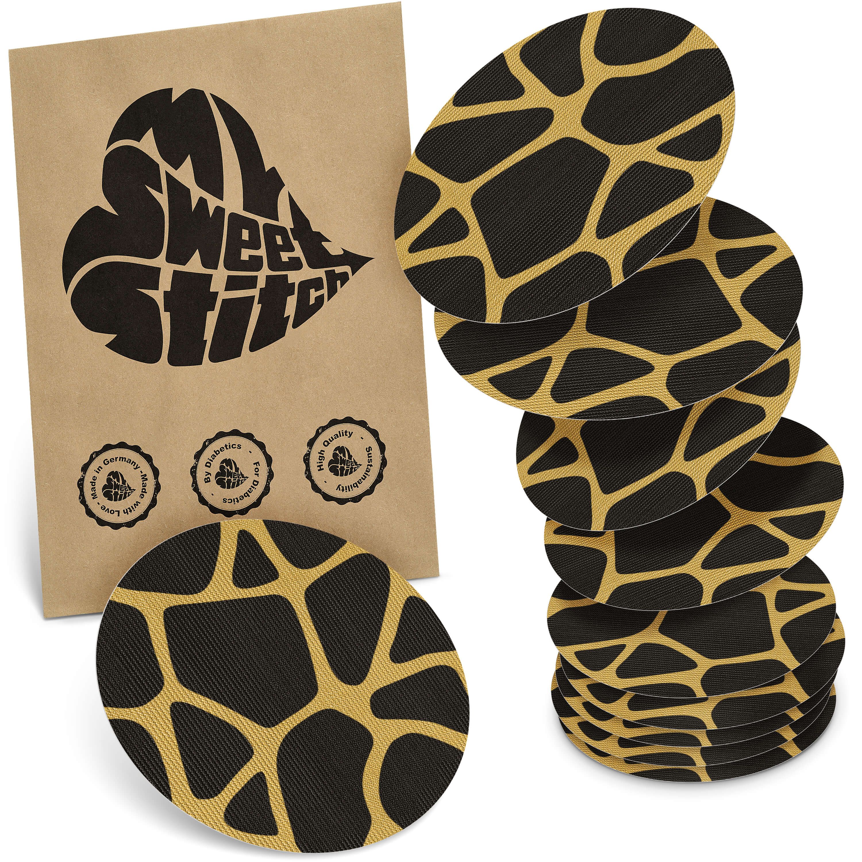 Ovale Pflaster mit schwarzem Grund und gelbem Muster. Verpackung mit Logo "MySweetStitch" und Qualitätssiegeln.