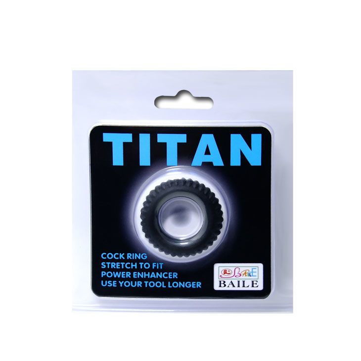 Verpackung mit schwarzem Cockring. Text: TITAN, COCK RING, STRETCH TO FIT, POWER ENHANCER.