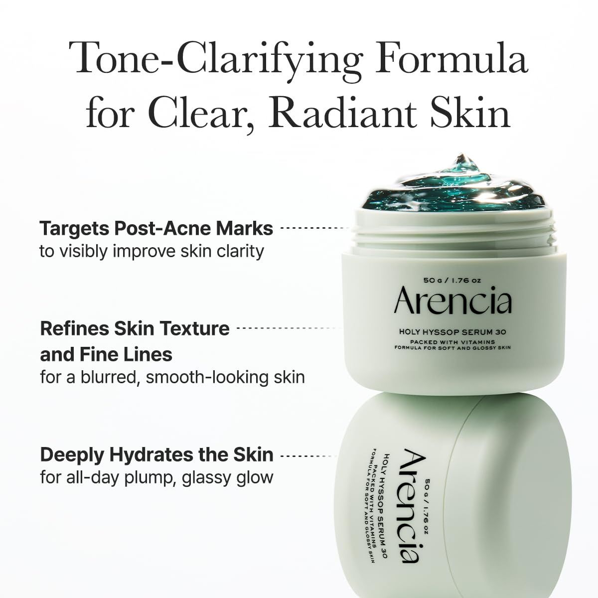 Zwei Tiegel Holy Hyssop Serum 30, einer geöffnet mit grünem Gel. Aufschrift: Arenchia. Text: Tone-Clarifying Formula.