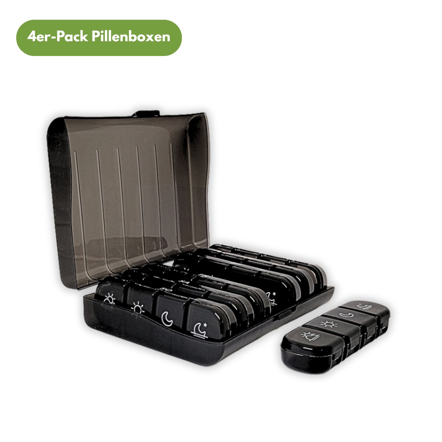 Schwarze Tablettenbox mit 4 Fächern, geöffnet. Ein separates Fach liegt daneben.