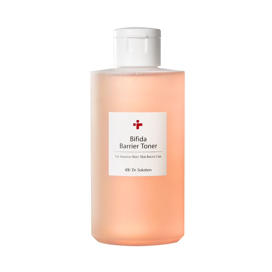 Eine Flasche mit rosafarbenem Inhalt und weißem Deckel. Auf dem Etikett steht "Bifida Barrier Toner".