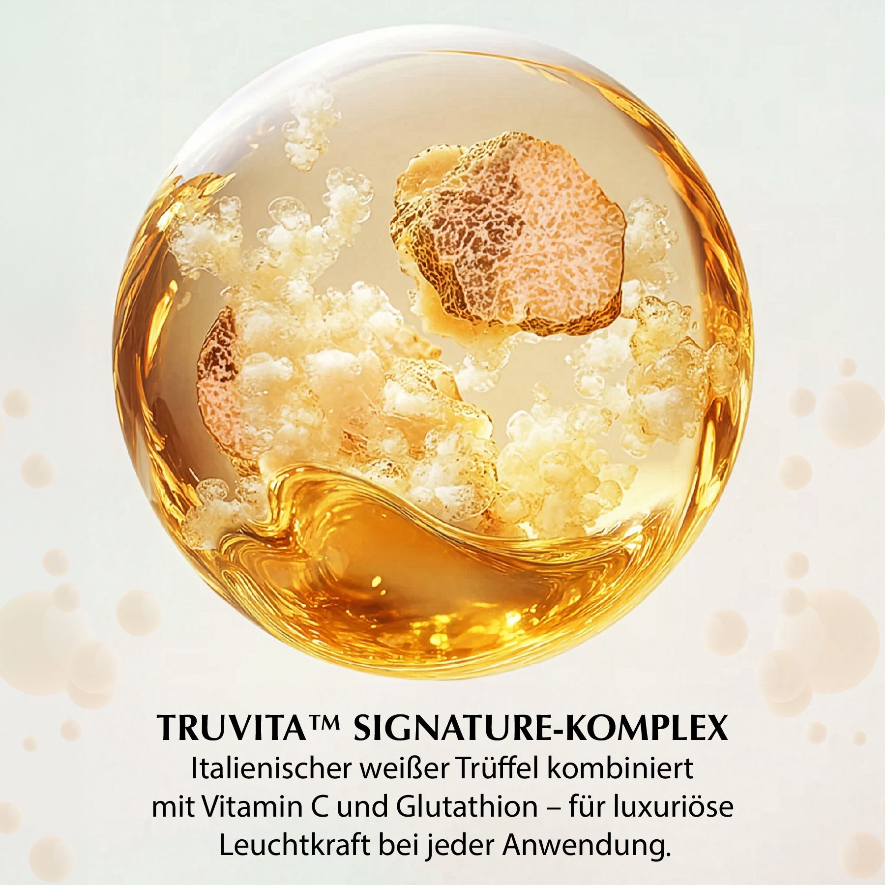 Eine Kugel mit weißem Trüffel. Text: TRUVITA SIGNATURE-KOMPLEX. Italienischer weißer Trüffel kombiniert mit Vitamin C und Glutathion.