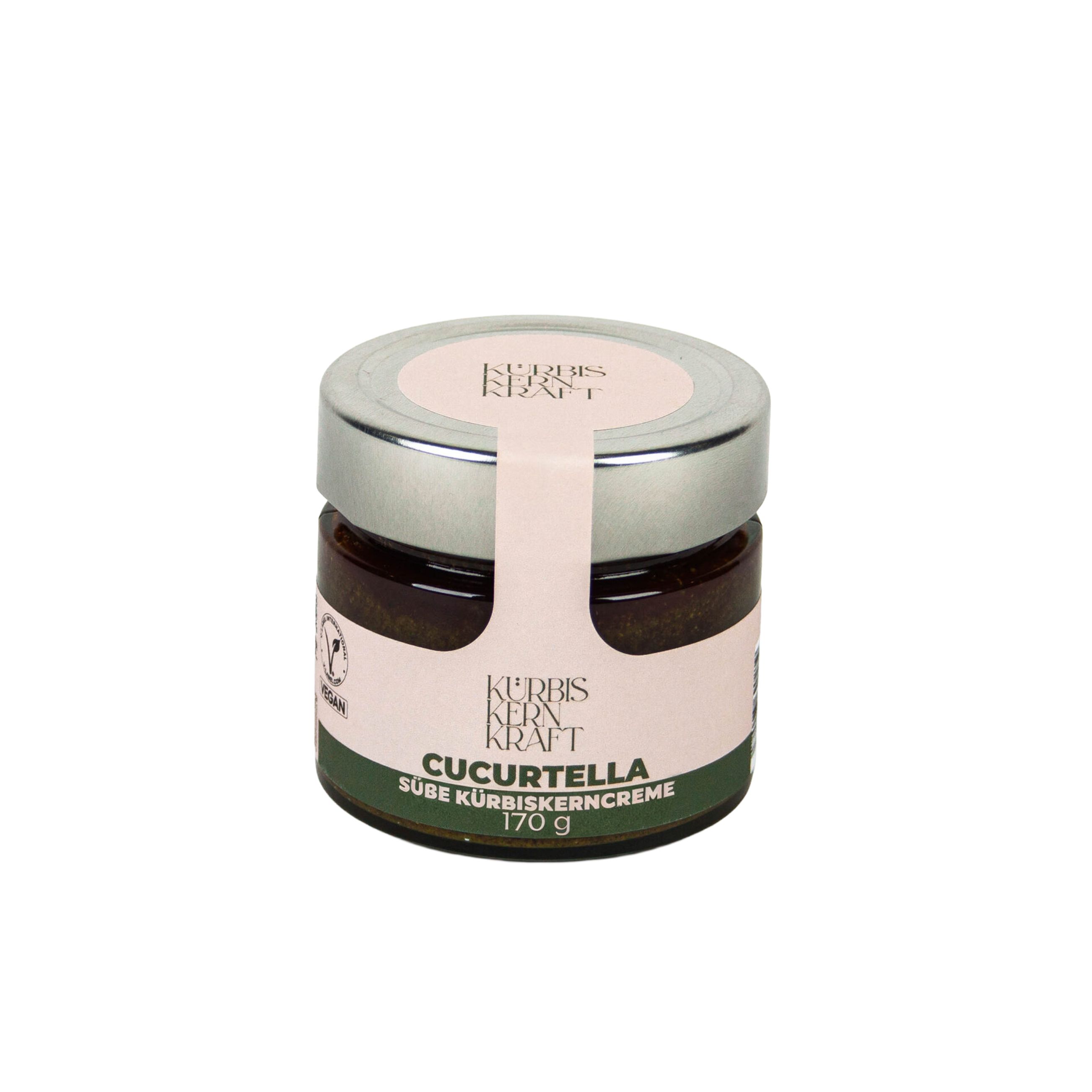 Glas mit Kürbiskerncreme. Deckel mit Logo. Etikett mit Produktname und Gewicht. Vegan-Siegel.