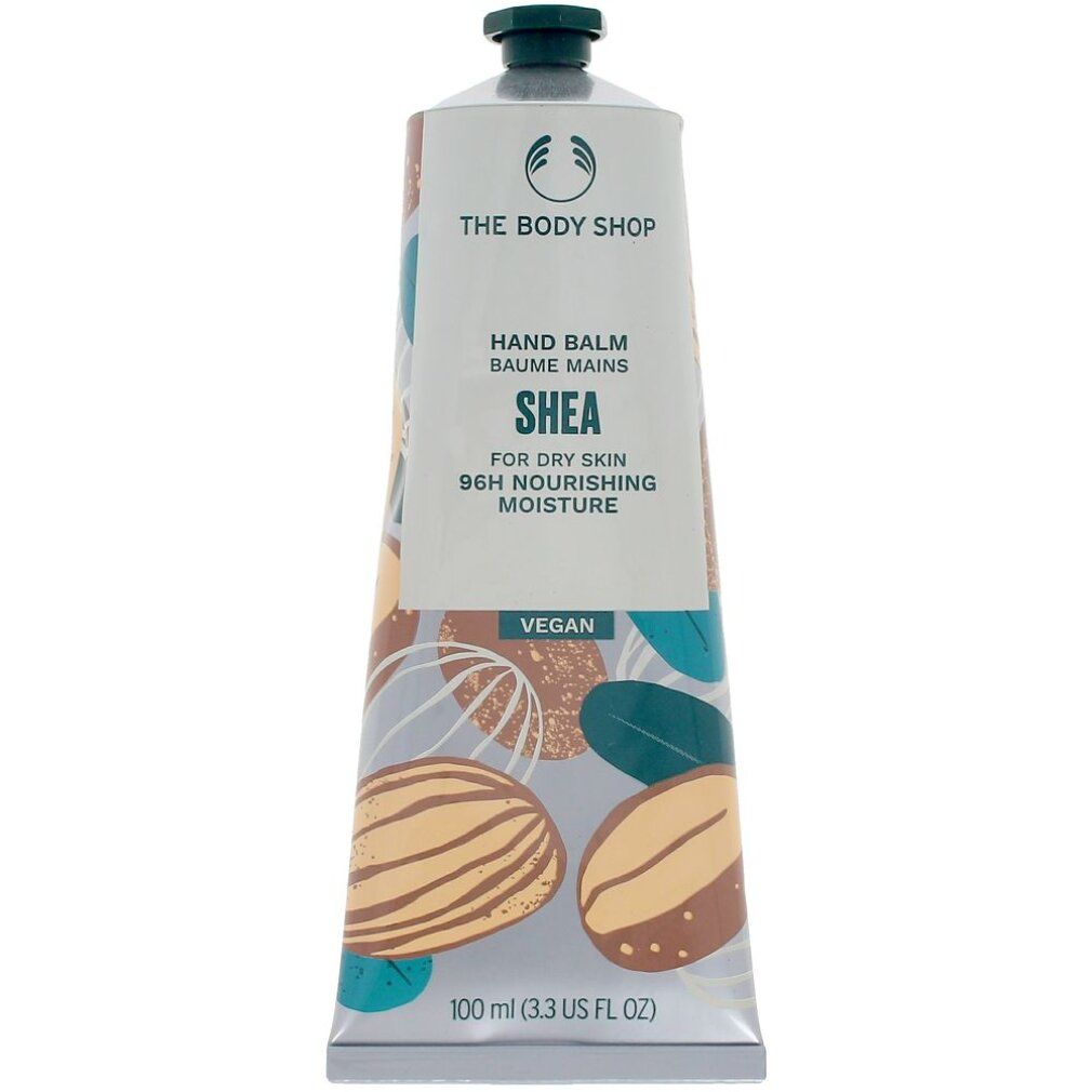 Tube Handbalsam. Aufschrift: Hand Balm, Shea, für trockene Haut, 96H Feuchtigkeitspflege. Vegan. Mandelmuster.