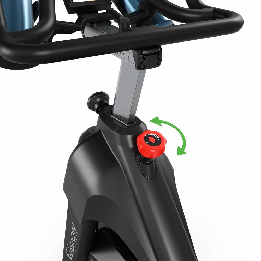Detailansicht des Indoor Cycle. Rotes Einstellrad mit Pfeilen. Vision-Logo sichtbar.