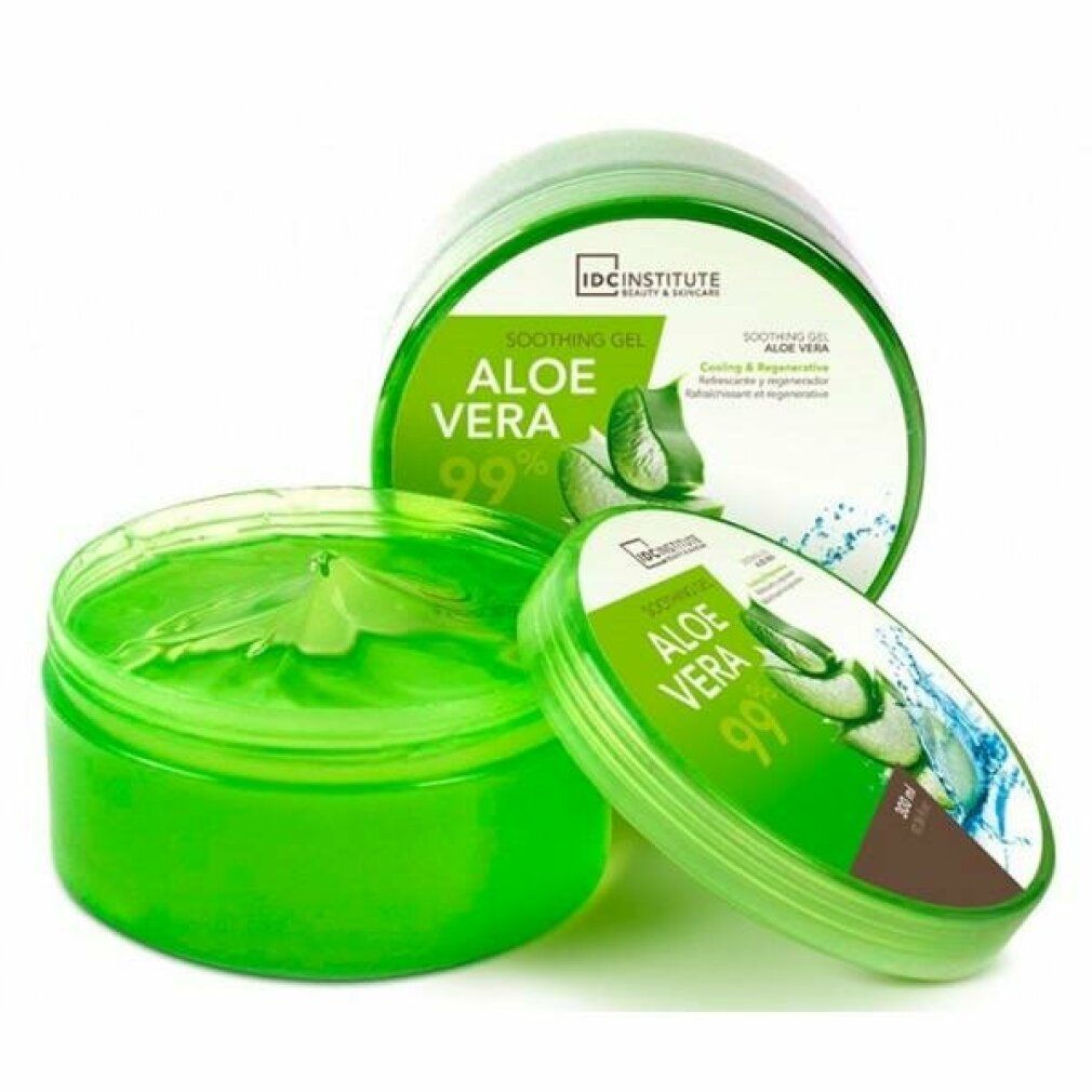 Grünes Gel in einem offenen Behälter, Deckel daneben. Aufschrift: Aloe Vera 99%, IDC INSTITUTE.