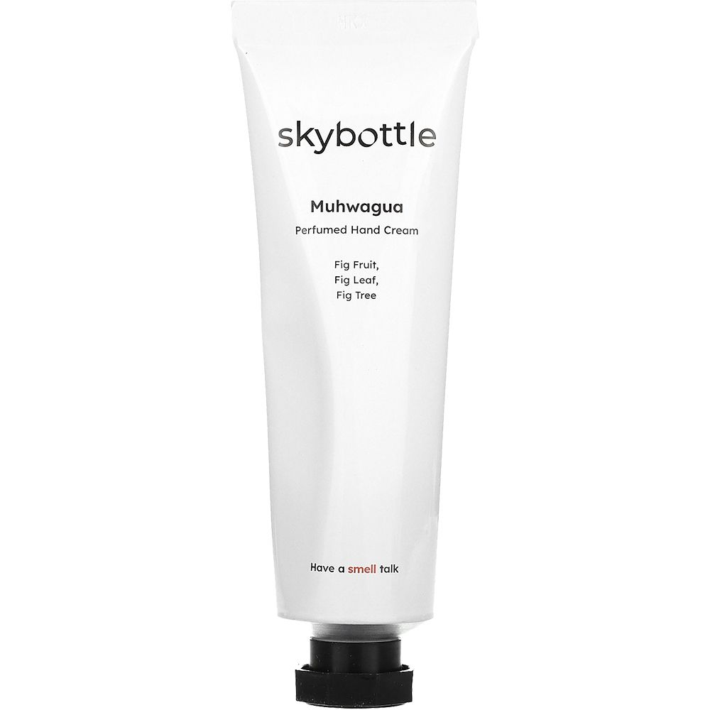 Weiße Tube mit schwarzem Deckel. Aufschrift: skybottle, Muhwagua Perfumed Hand Cream. Text: Fig Fruit, Fig Leaf, Fig Tree.