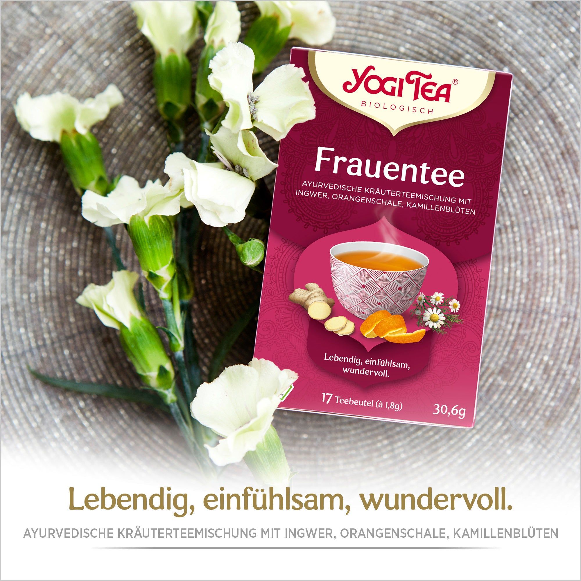 Packung Frauentee mit weißen Blüten. Aufdruck: Yogi Tea, Frauentee, ayurvedische Kräutermischung mit Ingwer, Orangenschale, Kamillenblüten. 17 Teebeutel.