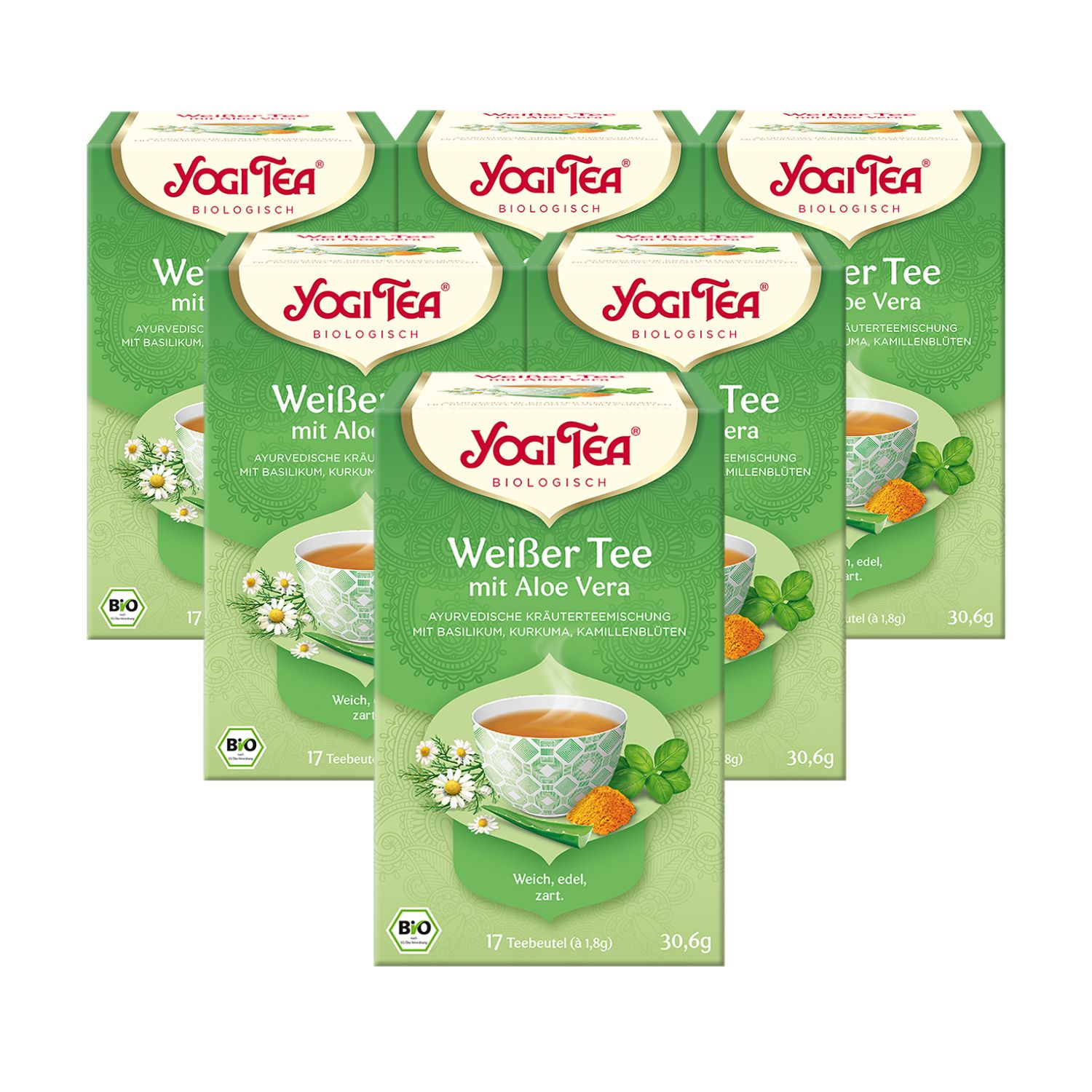 Mehrere Packungen Yogi Tea Weißer Tee mit Aloe Vera. Grüne Verpackung mit Logo und Produktbezeichnung. Bio-Siegel.