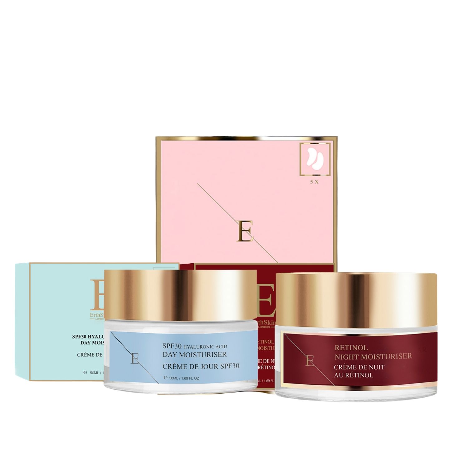 Drei Tiegel und zwei Schachteln. Aufschrift: SPF30, Retinol, Creme de Jour, Creme de Nuit. Goldfarbene Deckel, rosa und hellblaue Verpackung.